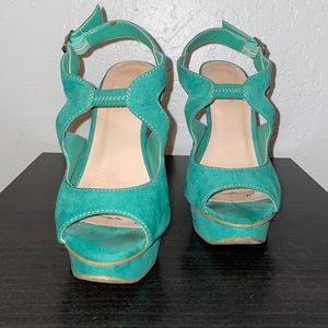 Teal suede platform heels